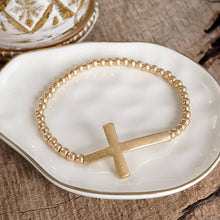 Load image into Gallery viewer, Minimal Cross Stretchy Bracelet in Worn Gold tone with Ball Beads
